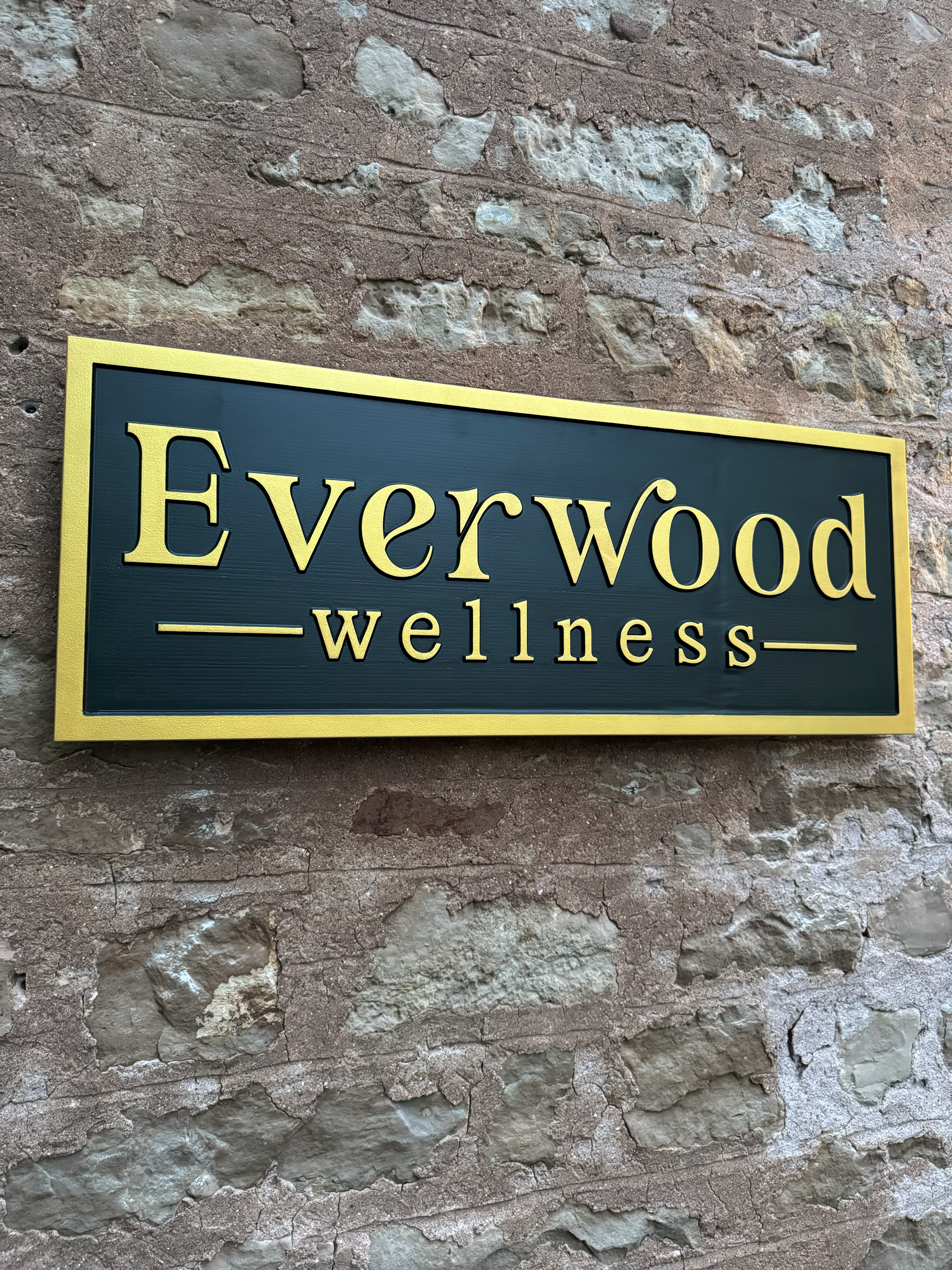 Everwood Wellness business signs